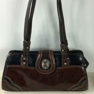 MC black and dark brown leather bag. NWOT